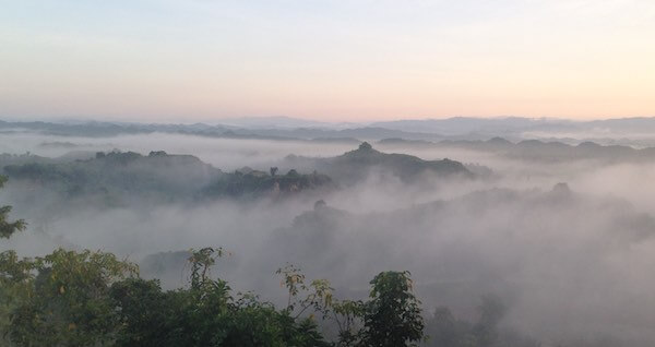 Fog and mist over the hill top pagodas of Mrauk U